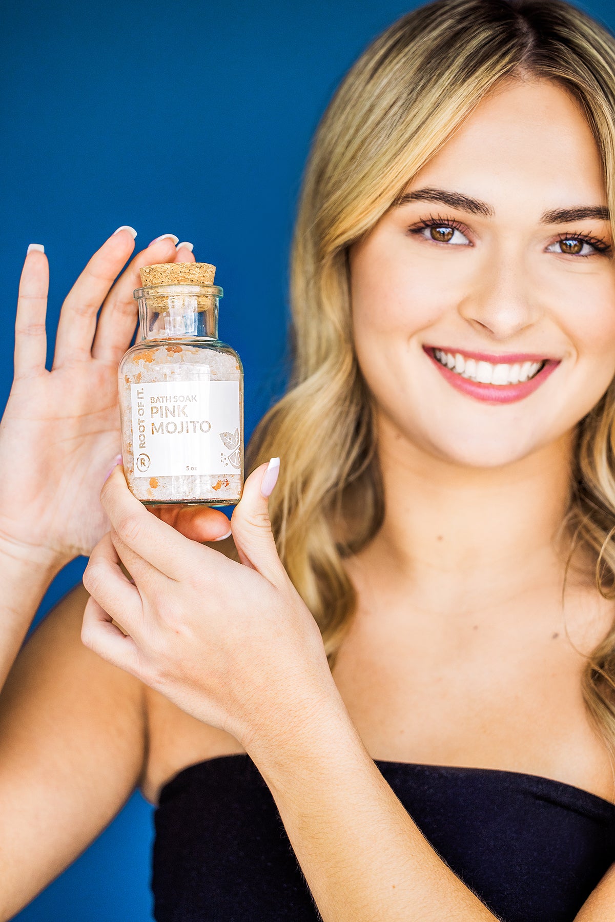 women holding bath salts
